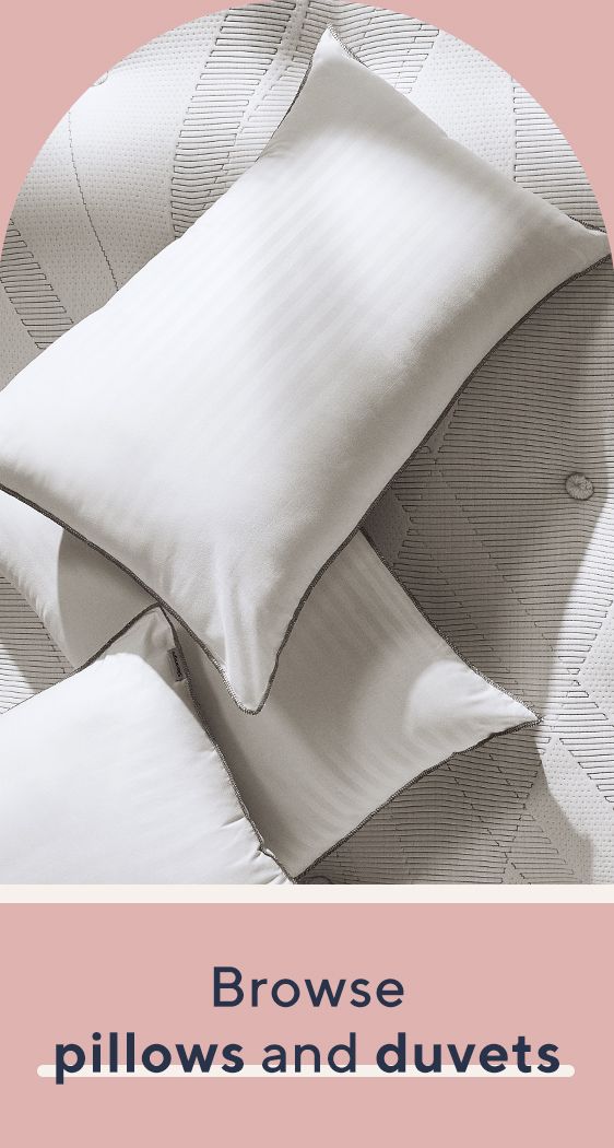 The Plush of Feather Pillows and Quilted Duvet